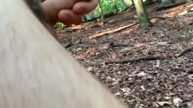 Naked in the park, edging and rubbing an uncut cock outdoors