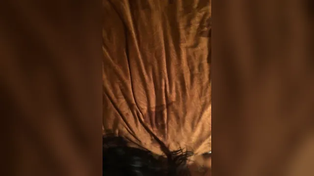 Masked amateur squirts while playing with a toy