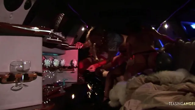 A well-off brunette MILF has a wild group fuck inside her limo