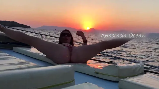 Anastasia Ocean strips completely at a boat party and touches herself outdoors