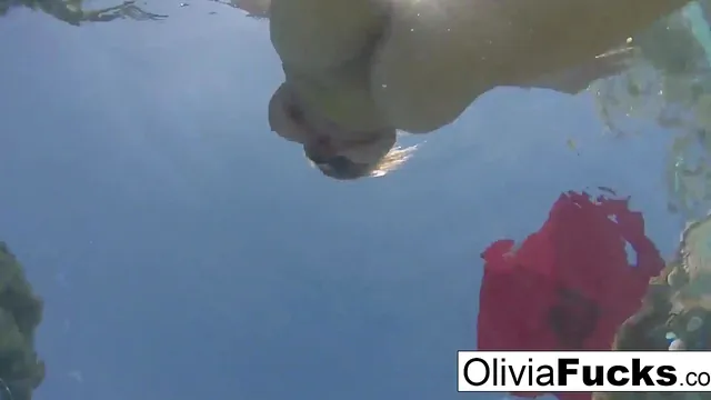 Olivia Austin spends a sunny day nude in the pool