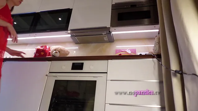 Bored redhead Matty strips down in the kitchen, long legs on show