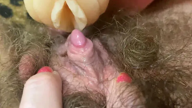 Extreme closeup POV of a hairy pussy with clit play and a real orgasm