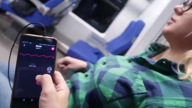 Woman reaches orgasm on a train with a remote controlled toy
