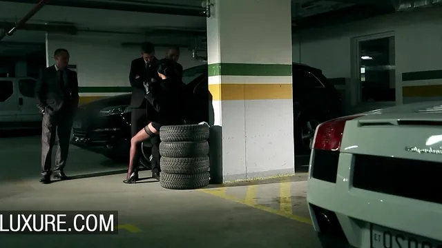 Anissa Kate takes on a whole group in a hardcore parking lot orgy