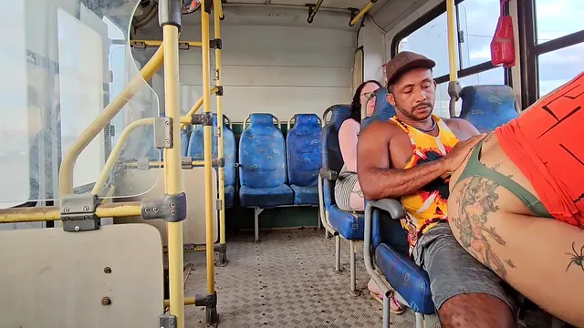 Brazen couple has sex on a bus while a rider in the back records it