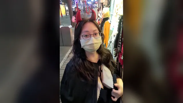 Busty exhibitionist shows off in public on Halloween