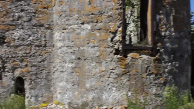 Mad Maura poses naked outdoors among the ruins of Totleben Island