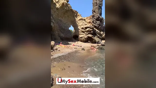 Brunette Anna Polina has interracial sex in public on an Ibiza beach