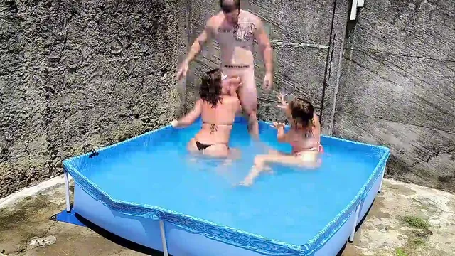 Naughty stepsisters make the pool party wild with a double blowjob