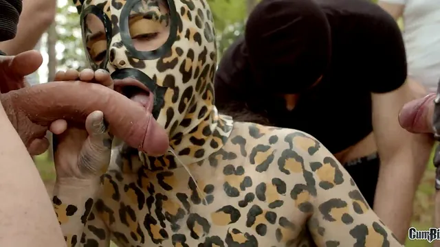 Cosplay woman gets a whole crowd of cocks outdoors, enough to last nine lives