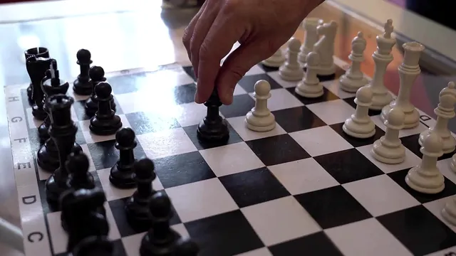 A friendly chess match turns into rough sex between two friends