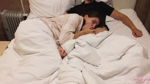 Brunette beauty sucks Thomasup's cock while they watch a movie
