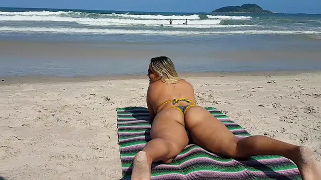 Paty Bumbum hunts for a guy with a bulge in his trunks as her husband watches