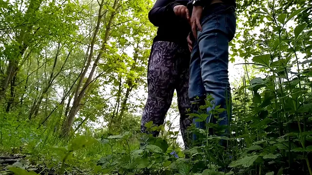 Elena, the curvy neighbor, gives Aleksandr a handjob outdoors