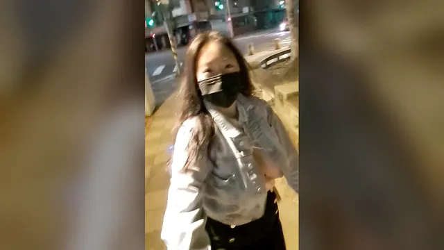 Busty exhibitionist in a retro style takes a relaxed walk in public