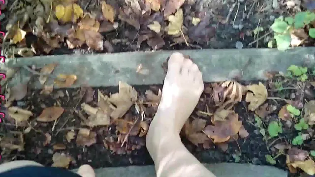Second part of an outdoor woods stroll in pantyhose, shoes off