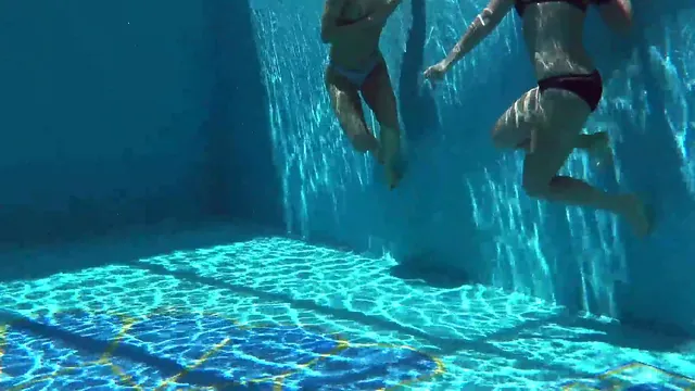 Jessica and Lindsay go nude for a poolside swim and an underwater show