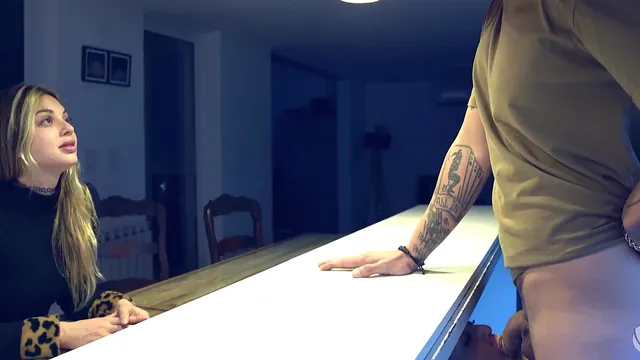 His wife's friend blows him beneath the kitchen table mid chat